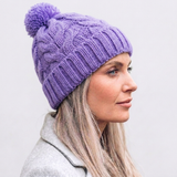 Women's Winter Hat with Pom-Pom Detail and Ear Protection Design