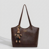 Women's Handbag with Detachable Charm and Elegant Trim Details