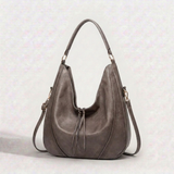 Women's Tassel Crossbody Handbag with Spacious Interior and Versatile Design